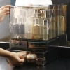 Weiwen showcases the popular dust-proof cosmetic storage box with an acrylic square top, lipstick and skincare product rack, and a transparent dressing table top Specification image